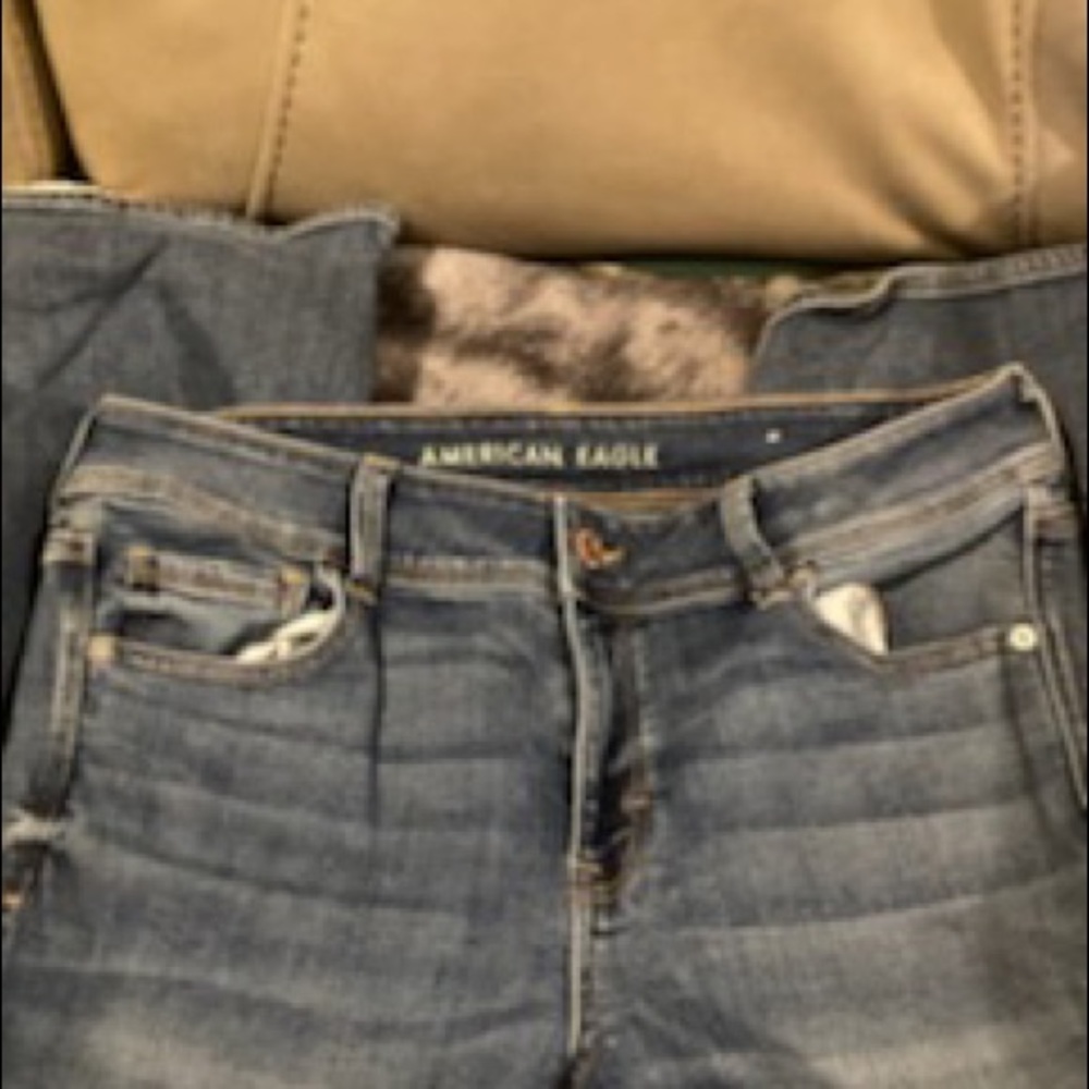 TWO pairs of LIKE NEW AMERICAN EAGLE jeans